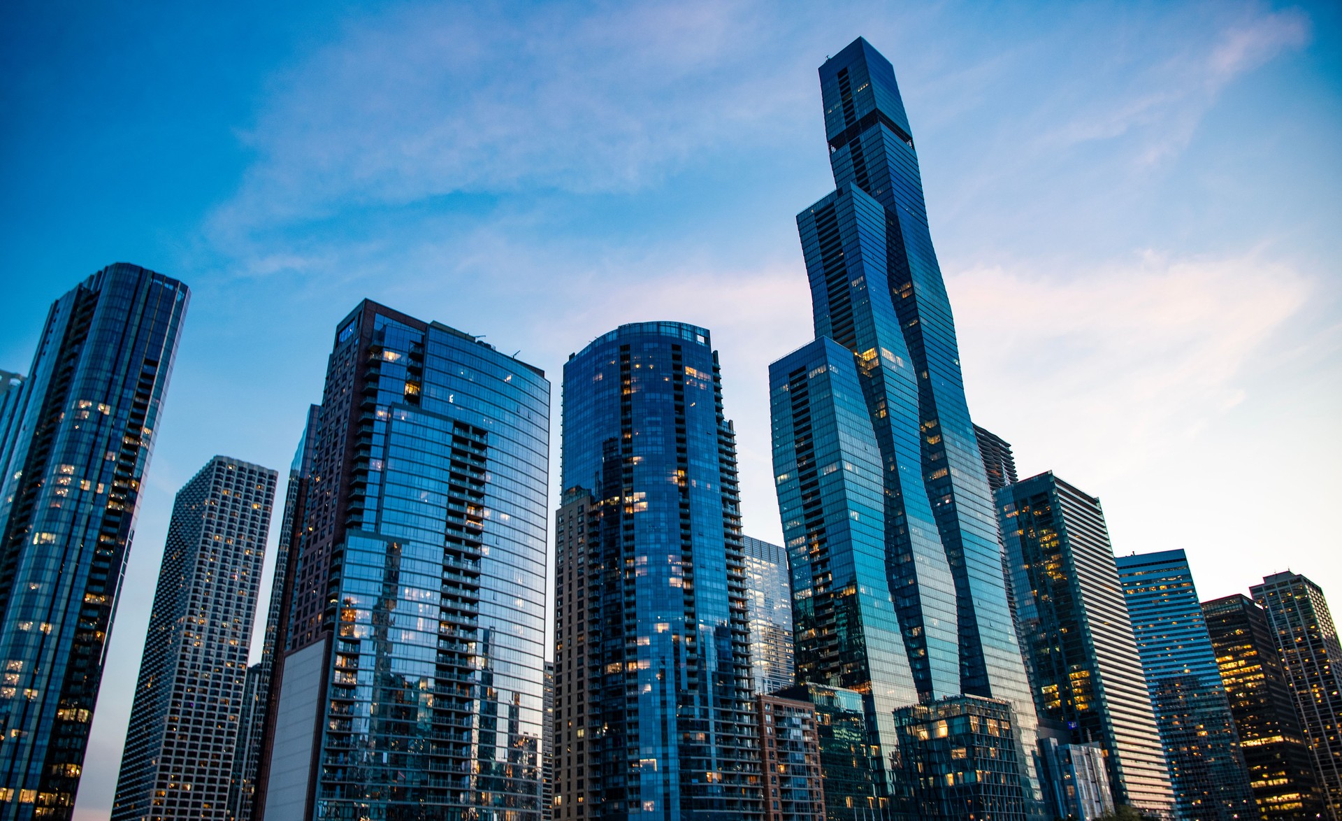 Skyscraper in city. City downtown with skyscraper. Office building business district. Modern building. Chicago city. High perspective. Skyscraper building architecture. Business skyscraper of glass